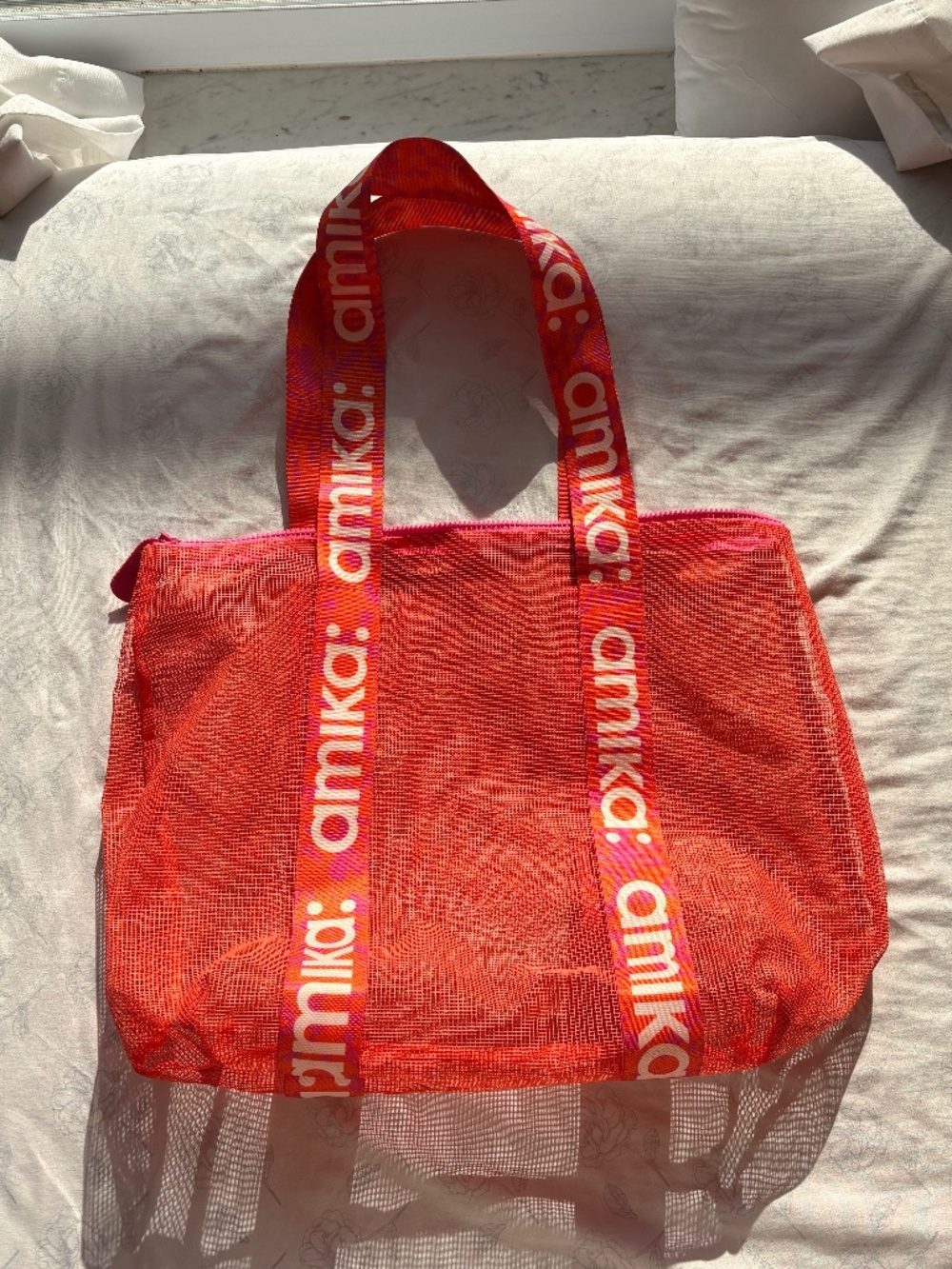 amika signature pink and orange mesh tote bag